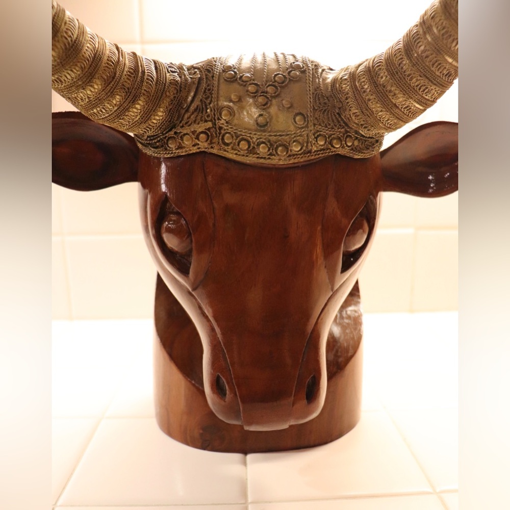 WOODEN BULL'S HEAD WITH TOREADOR HAT